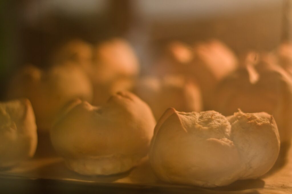 brown and white pastry on brown wooden table